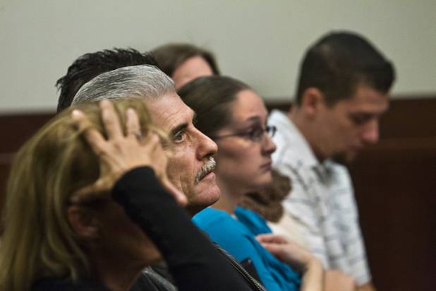 Family members and supporters of Colin Lowrey listen to some details of his alleged crime during a bail setting in Henderson Justice Court Wednesday, Nov. 6, 2013.